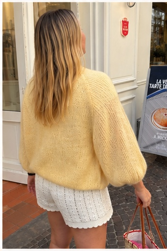 Tropézien Cardigan displayed with French café and bakery lifestyle inspiration for summer knitting.